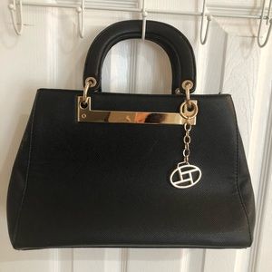 Black and gold leather purse